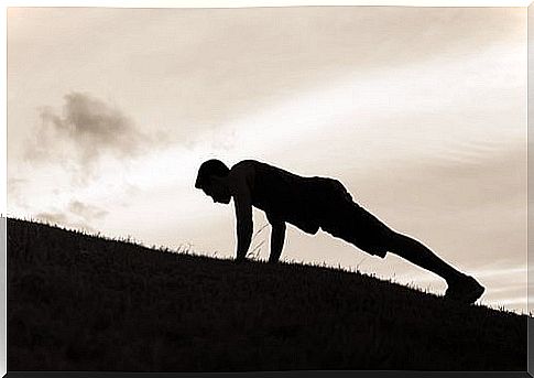 A man doing arm bends