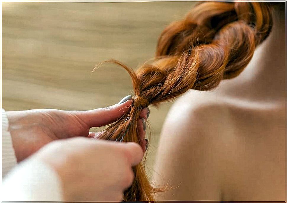 Woman dying braided hair