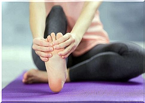 Woman stretching - perfect and healthy feet