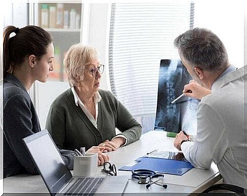 Doctor talks to patient about bone metastases