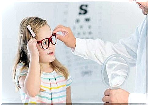 Girl trying on glasses