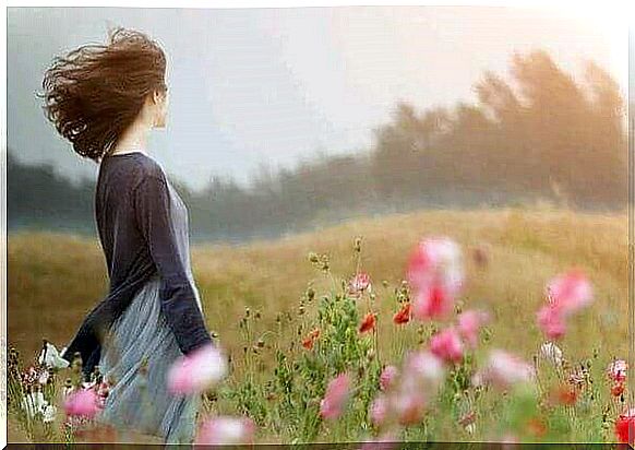 Woman on flower field