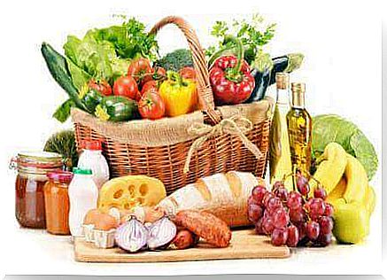 Different foods in basket and on table