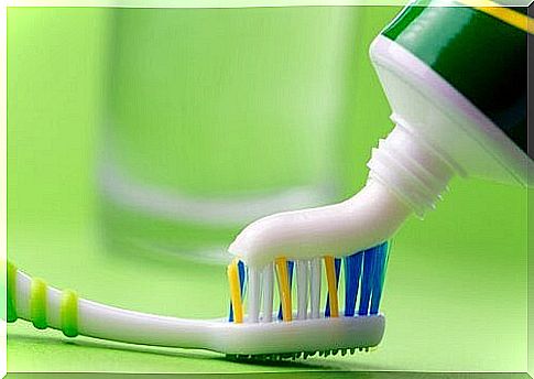 Toothpaste applied to a toothbrush - clean your iron